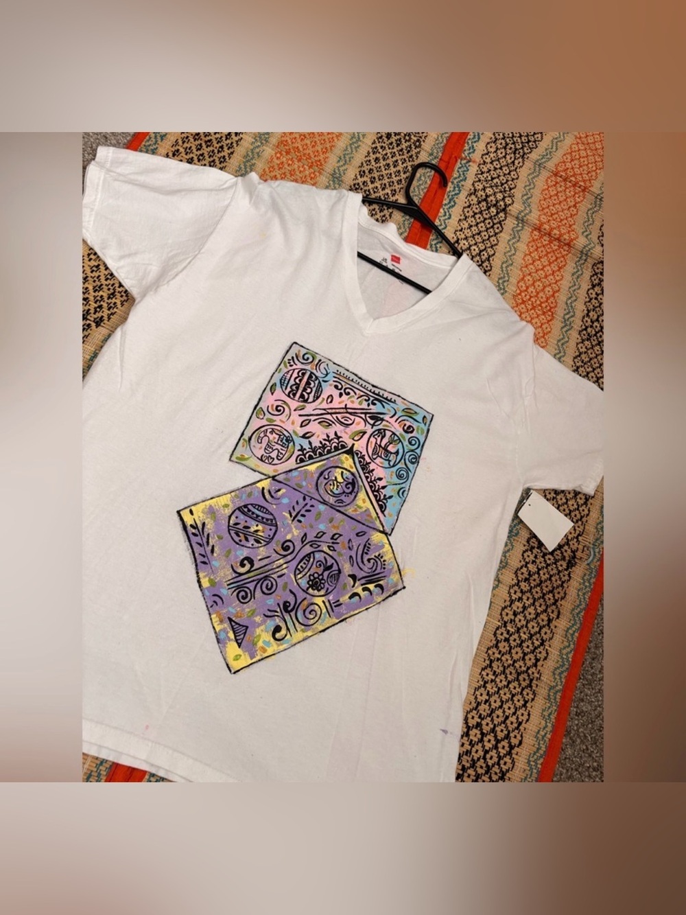 White Kids V-Neck Tee with Pastel Geometric Graphic